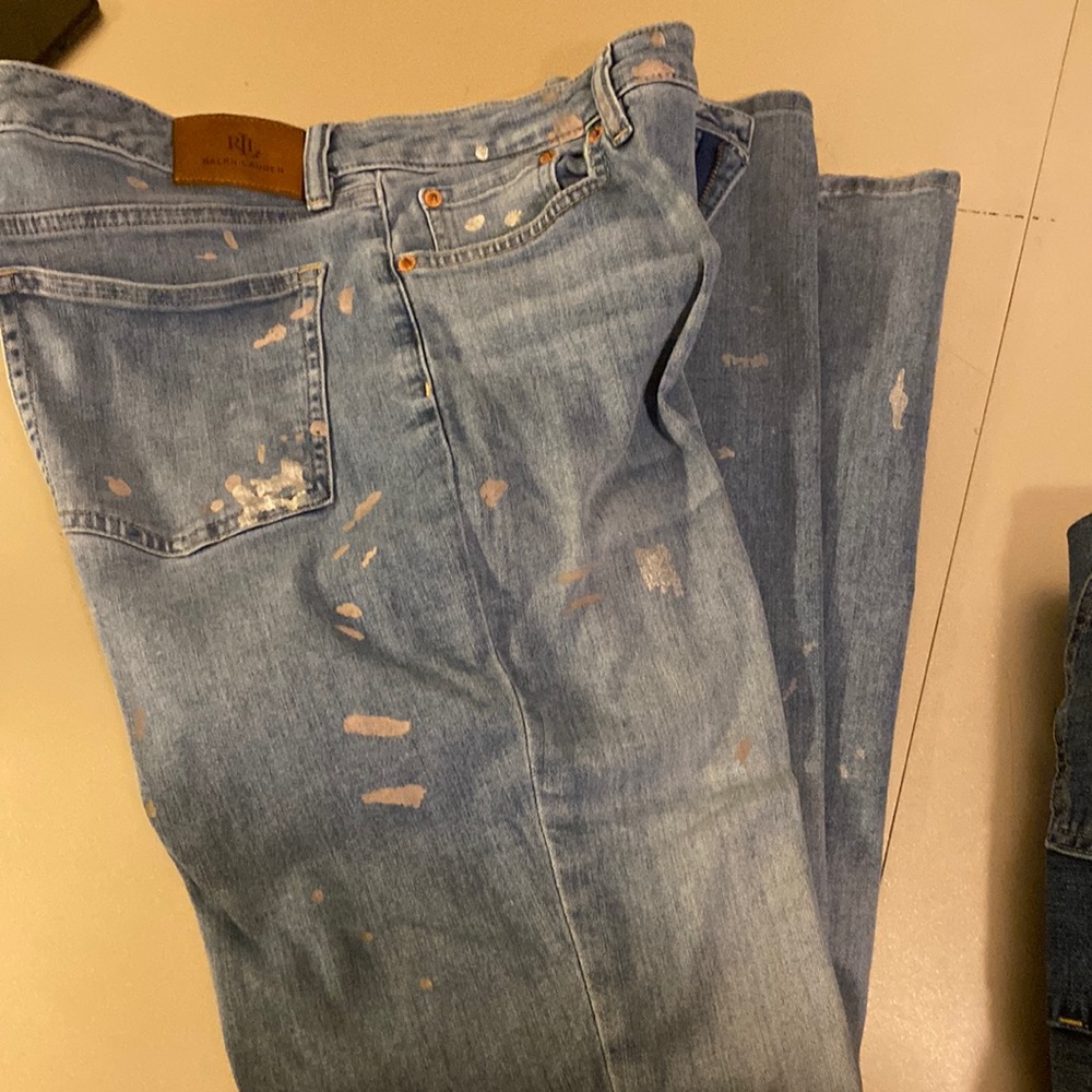 Women paint splatter blue jeans. Light color jeans. Size 12 excellent condition.